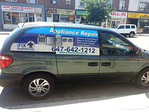 I-fix appliance repair technician vehicle with a car wrap appliance repair advertisement